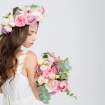 Sensual attractive woman with long curly beautiful hair in wreath